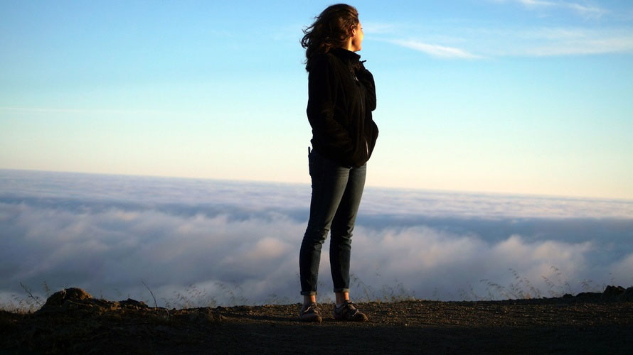 girl-on-mountain-ledge-(1)